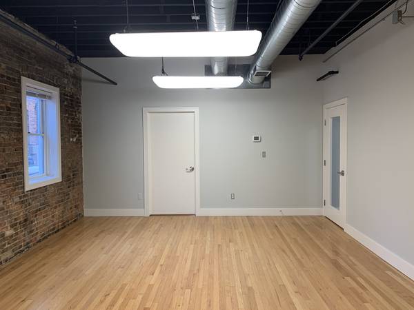 Washington & 4th feat Brick, window, common kitchen & waiting area 202 1