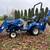 New Holland Backhoe tractor w/ loader Workmaster 25S back hoe 1 thumbnail