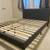 Upholstered Queen bed frame - almost new! 1 thumbnail