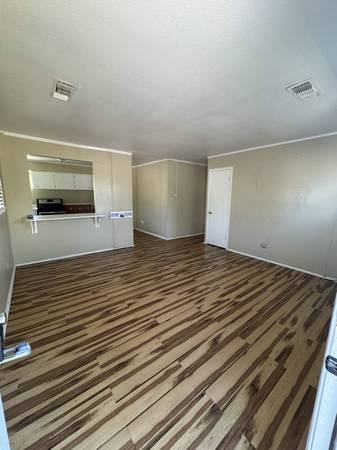 1 3 bed 1 bath covered Carport. Central AC, nice flooring, Big yard $1,3 1