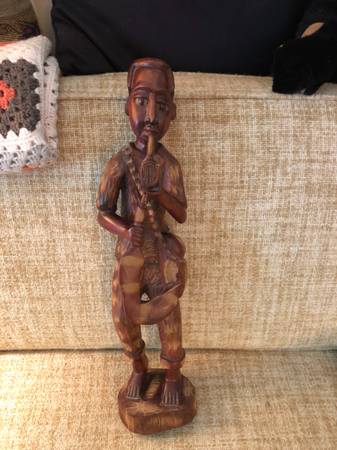 Jamaican Hand Carved Statue of a Man Holding a Pipe and Sickle, Created from a S 1