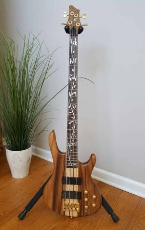 Bass Guitar with Coffin Case and tooled leather strap 1