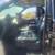
This is a black 2004 Ford F-150 SuperCrew truck featuring aftermarket lift kit, 3 thumbnail