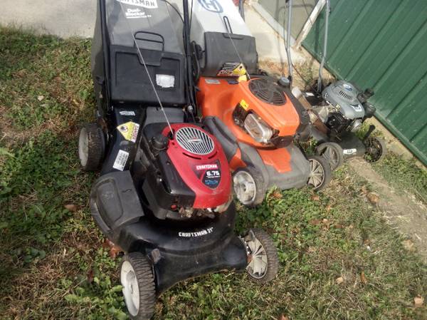 3 used push mowers 1