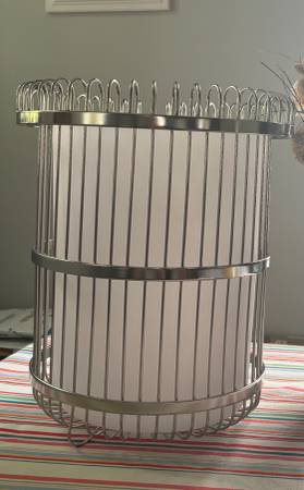 Polished chrome wastebaskets. 1