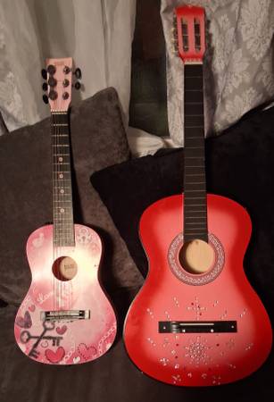 2 Beginner Acoustic Guitars  Hot Pink .... 1