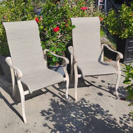 Two highback aluminum stackable sling patio chairs 1