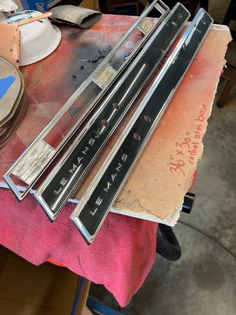 1966 GTO / LeMans grab bar bezels 1