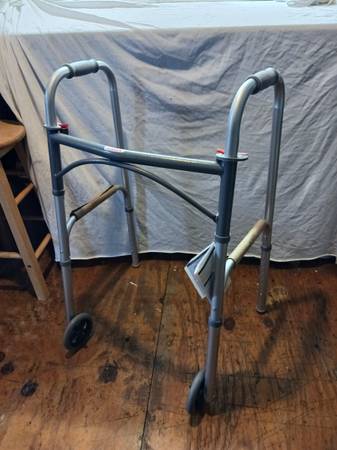 WALKER. New. Adjustable. Foldable 1