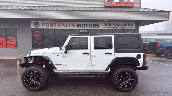 POST FALLS MOTORS. COM 2015 Jeep Wrangler Unlimited Rubicon Sport Util 1