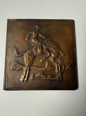 vintage copper relief wall plaque featuring a cowboy riding a bucking 1