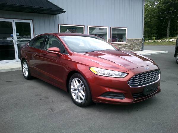 Ford Fusion SE Bluetooth, entrada auxiliar, automóvil limpio y confiable **1 año de garantía** - $6.995 (**Garantía nacional de 1 año/12.000 millas**)63437569683715122