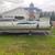 1993 Classic Lowe pontoon boat with 75 HP motor and nice trailer 1 thumbnail