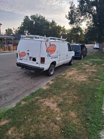 98 3qt ton ford van runs great (Miles city)