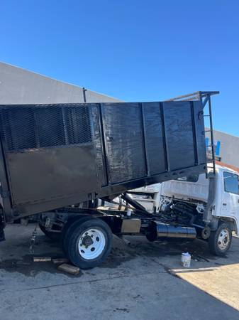 Dump truck Isuzu npr 1