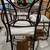 GLASS TOP IRON ROUND TABLE WITH 4 CHAIRS 7 thumbnail