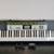 Casio Piano Keyboard LK-135 Digital 61-Key Lighted Songs 1 thumbnail