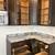 Kitchen cabinets with appliances and granite countertop 11 thumbnail