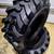 Four New 10-16.5 skid steer tires with rim guard 2 thumbnail