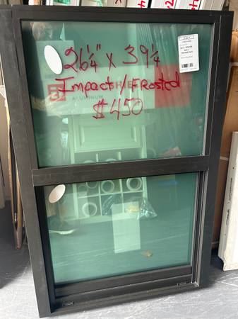 New impact bronze window 26 1/4 x. 39 1/4. $450. 1