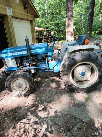 Tractor with bushhog, finishing mower and pull cart - $8,500 (Gardendale)63470632120193124