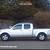 2008 Nissan Frontier LE 4x4 4dr Crew Cab 6.1 ft. SB 5A 2 thumbnail