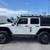 2016 Jeep Wrangler Unlimited Sport S Sport Utility 4D 4 thumbnail