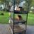 three stacked rabbit cages with two nesting boxes and three water bottles on whe 3 thumbnail
