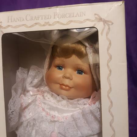 New in the Box 3-Faced Porcelain Doll - $150 (Dothan)63440451037441120
