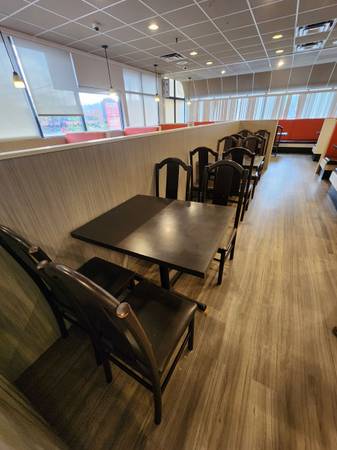 Restaurant chairs, small table, and storage ends 1