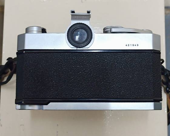 Konica Autoreflex T with 52mm lens (35mm film camera) ). - $130 (Downtown)63471379007745123