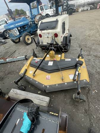 6ft mower finish goes behind  Ford  tractor 1