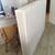 Queen size box spring and bed frame with casters. 1 thumbnail