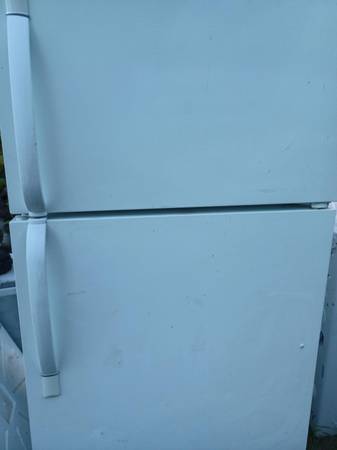 Refrigerator  top freezer like new 4 months warranty 1