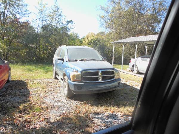 TWO DODGE DURANGOS 1