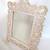 Vintage Tabletop Mirror with Ornate Cream Colored Cast Iron Frame 1 thumbnail
