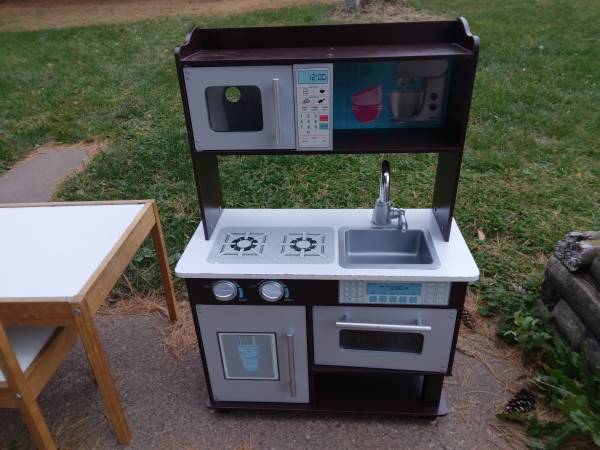 Toy kitchen and  table and chairs 1