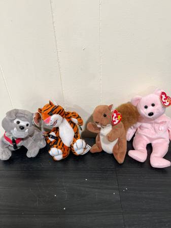 A collection of four vintage TV beanie babies 1