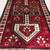 Hand knotted Persian Tribal rug 5’ X 9’ 1 thumbnail