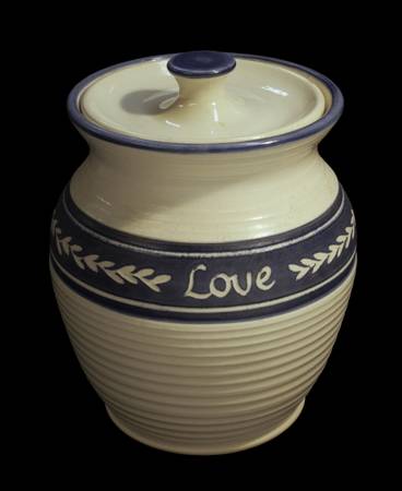 Graystone pottery vase with lid, "Love" on side 1