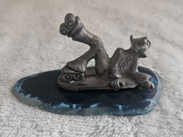 Vintage pewter clown with roller skates 1