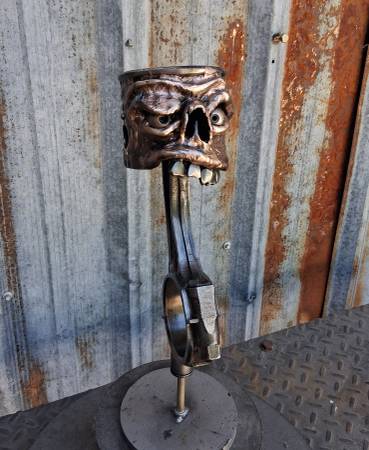 Hood ornament Shift knob Steering wheel Differential cover 1