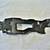 1996-98 Pontiac Grand Am NOS left headlight bracket 2 thumbnail