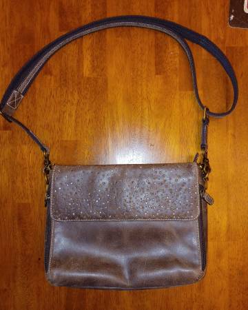 Leather purse built in holster and other misc. purses and wallets. $25 1