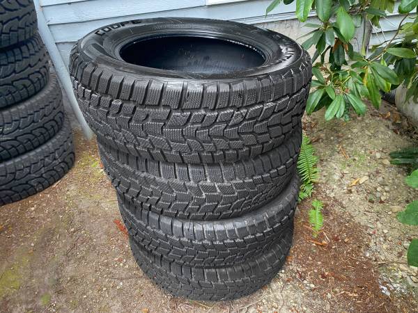 New Cooper Evolution Winter Tires    245/60 R18    Set of 4 tires 1