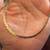 18 inches of 14K Yellow Gold Herringbone Necklace that goes around 11 thumbnail