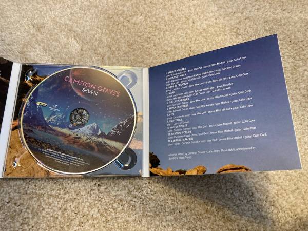CD autografiado "Seven" de Cameron Graves - $25 (Viena)63470449215489121