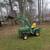John Deere 425 tractor with loader and attachments 1 thumbnail