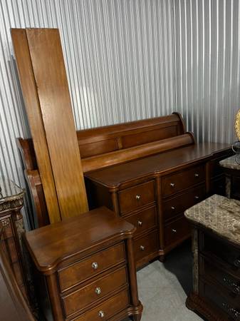 Basic king-size bedroom set with sleigh bed, nightstand, and dresser 1