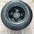 SPARE TIRE + WHEEL  Goodyear Wrangler ST 235/75R16 106 S 1 thumbnail